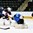 GRAND FORKS, NORTH DAKOTA - APRIL 23: USA's Kieffer Bellows #22 scores a first period goal against Finland's Ukko-Pekka Luukkonen #1 while Otto Makinen #25 defends during semifinal round action at the 2016 IIHF Ice Hockey U18 World Championship. (Photo by Minas Panagiotakis/HHOF-IIHF Images)

